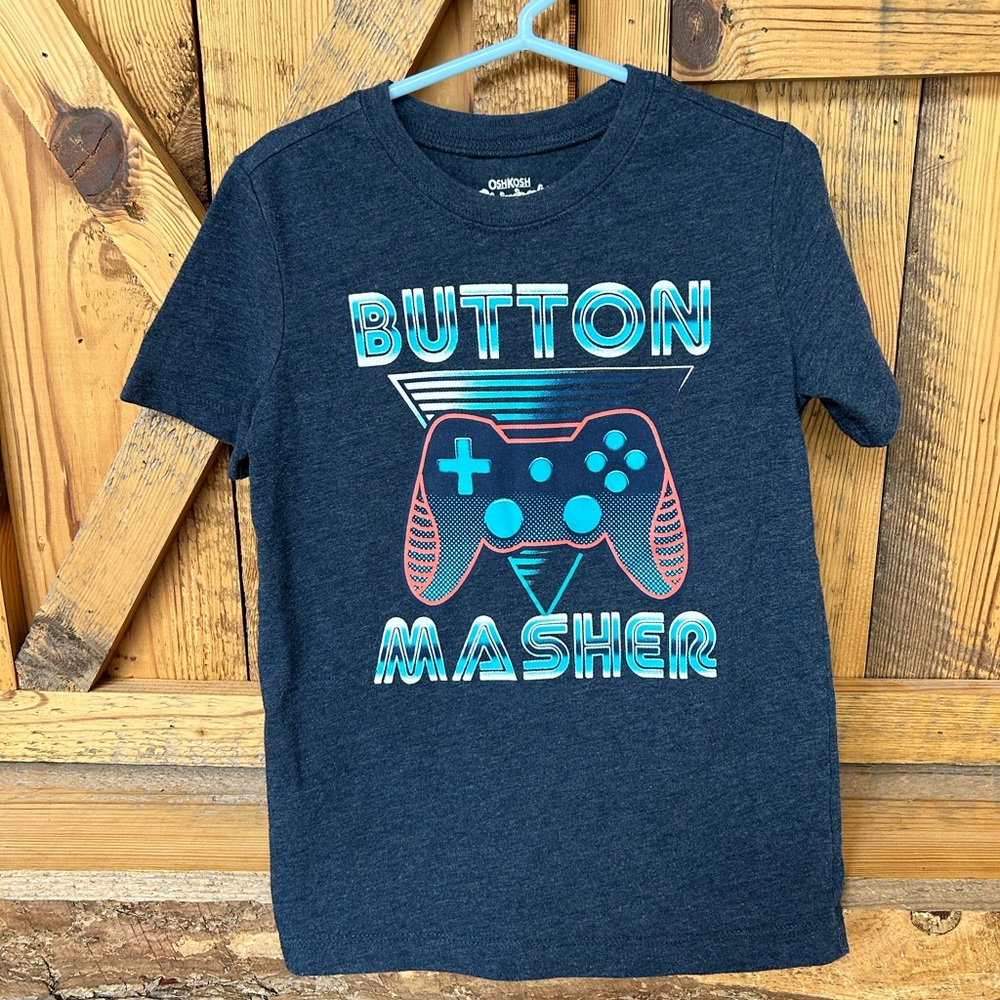 Boys OshKosh knit navy blue T-shirt. Gamer. Size 6.